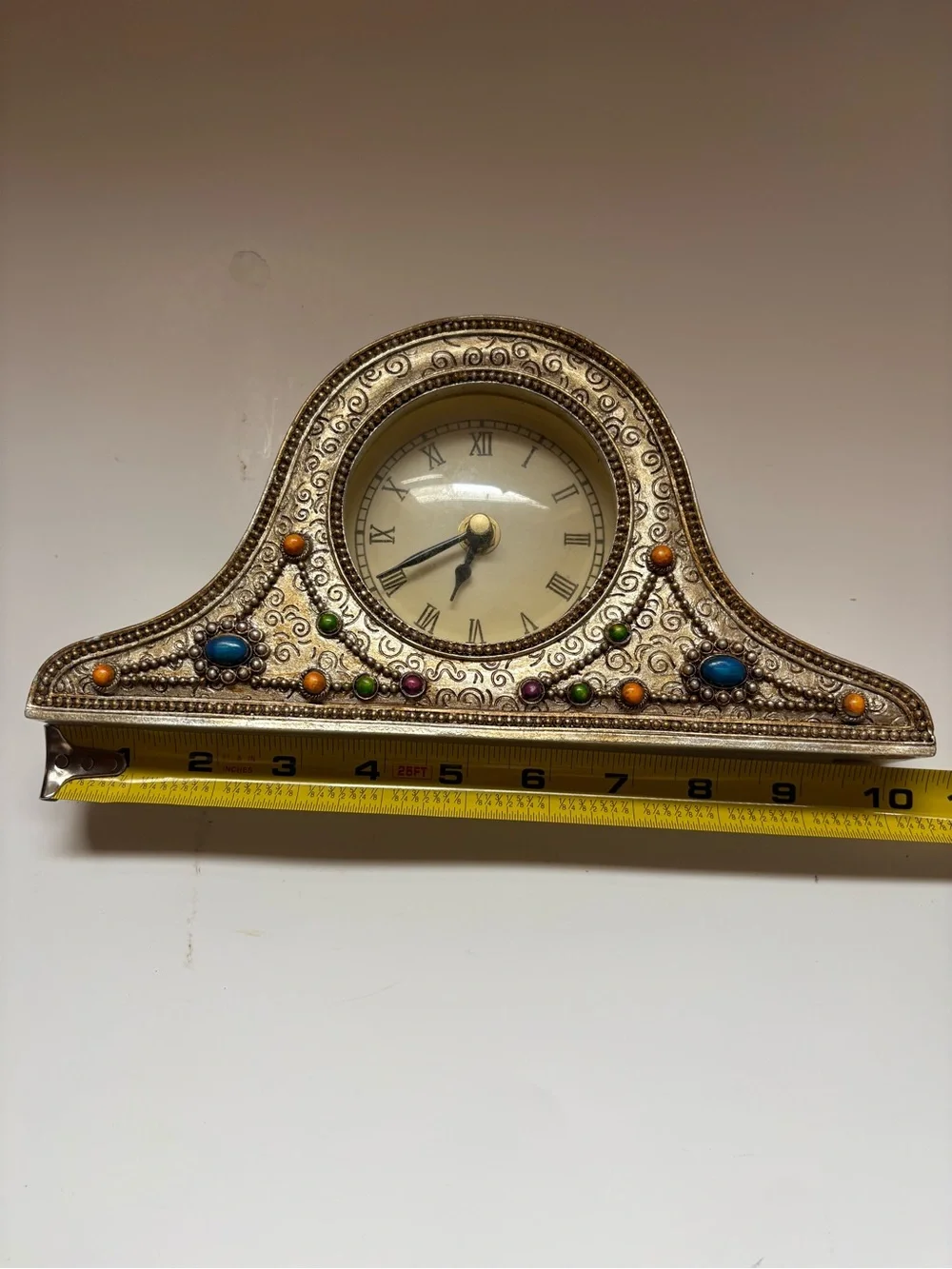 Ornate Silver-Tone Mantel Clock with Multicolor Accents